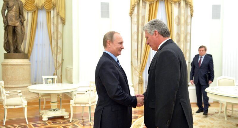 Путін і президент Куби